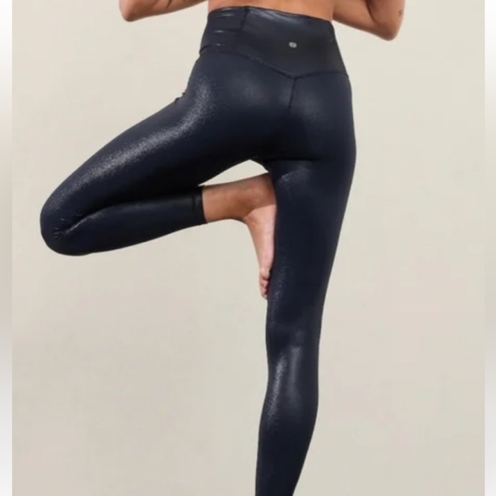 New never worn Athleta elation shine navy blue size large